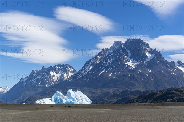 Iceberg and cloud formation, Lago Grey, Torres del Paine National Park, Parque Nacional Torres del