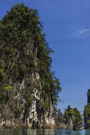 Limestone rocks in Cheow Lan Lake in Khao Sok National Park, nature, travel, holiday, lake,