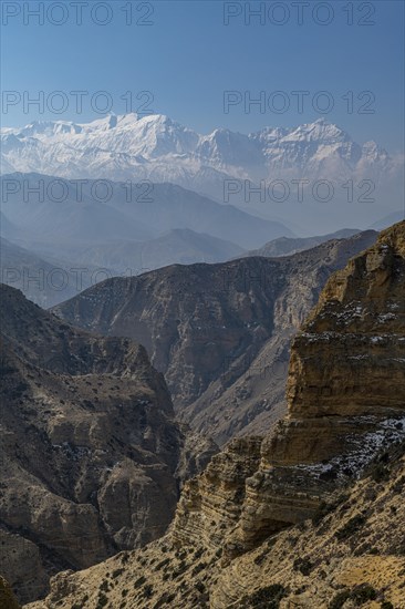 Desert mountain scenery with the Annapurna mountain range in the background, Kingdom of Mustang,