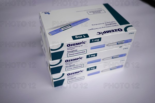 Four stacked Ozempic medication boxes on a light-coloured background, for diabetes 2 patients,