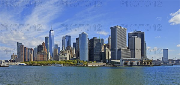 Skyline with skyscrapers in the Financial District, Battery Park in the foreground, One World Trade