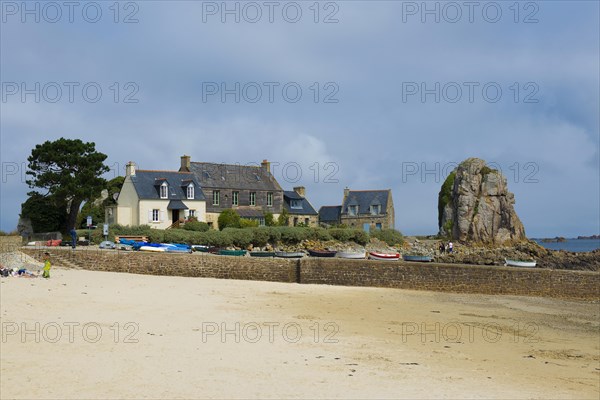 Houses and granite rocks on the beach, Plougrescant, Cote de Granit Rose, Cotes d'Armor, Brittany,