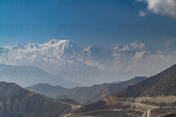 Desert mountain scenery with the Annapurna mountain range in the background, Kingdom of Mustang,