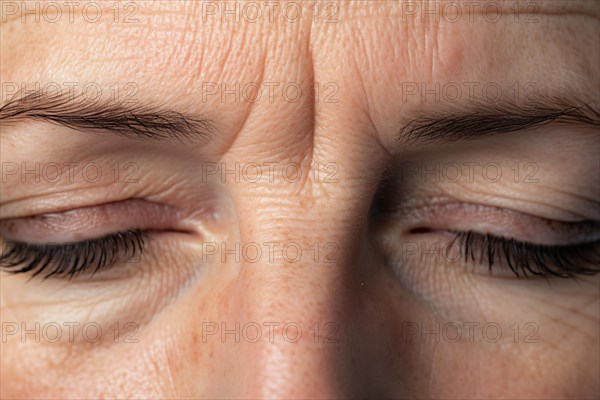 Close up of frown line wrinkles between eyes and eyebrows of middle-aged woman. KI generiert,