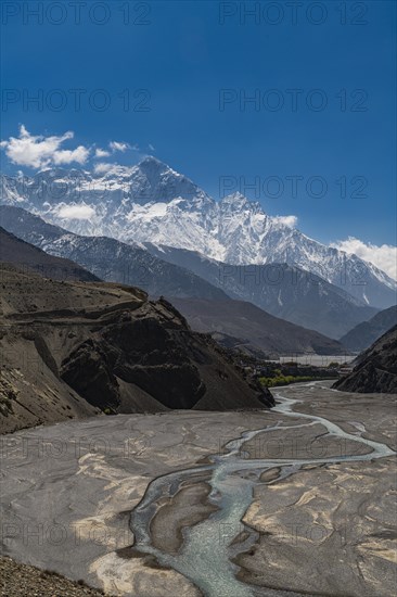 Huge riverbed before the Annapurna mountain range, Kingdom of Mustang, Nepal, Asia