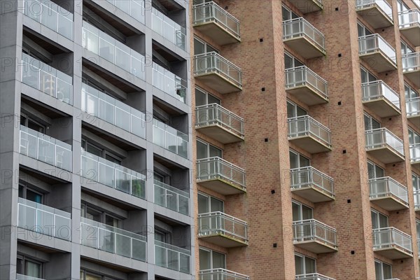 Multi-storey apartment building with glass balconies and brick exterior, Blankenberge, Flanders,