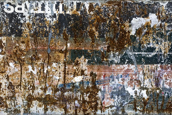 Old texture of a billboard, paper, colourful, torn, torn, texture, background, billboard, faded,