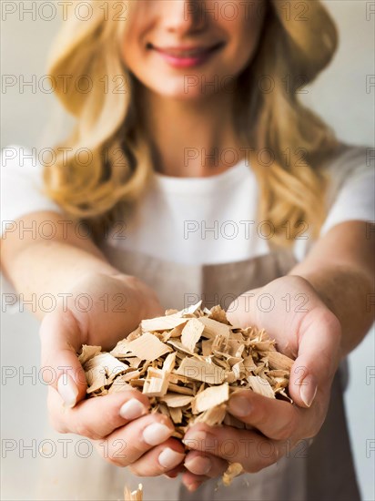 Holding woodchips in your hands, woodchips, renewable fuel, climate change, AI generated, AI