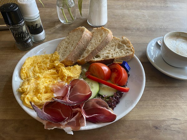 Food, breakfast, scrambled eggs, bread, South Tyrolean ham, tomatoes, cucumber, cappuccino, salt,