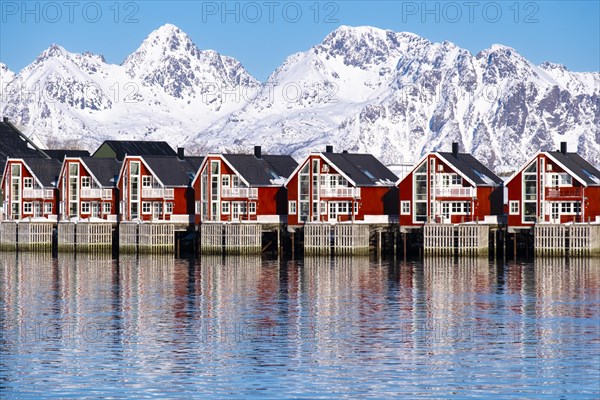 Lofoten, Norway. Solvaer, Nordland province. Holiday flats by the harbour basin, Svolvaer,