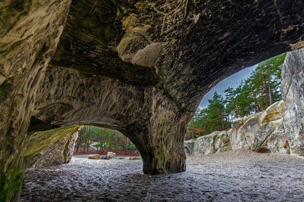 Engravings in the Sandhoehlen, sandstone caves in forest called Im Heers below the crags of