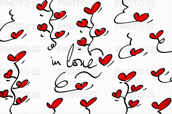 Street art, painted house wall with hearts and lettering on the theme of love, Montmartre, Paris,