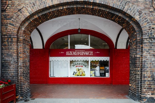 Nikiszowiec, Poland, 14 April 2020: Shop window of grocery shop in the mining district of Katowice,