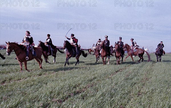 Actors in historical uniforms re-enact the battle in historical battle scenes on the 185th
