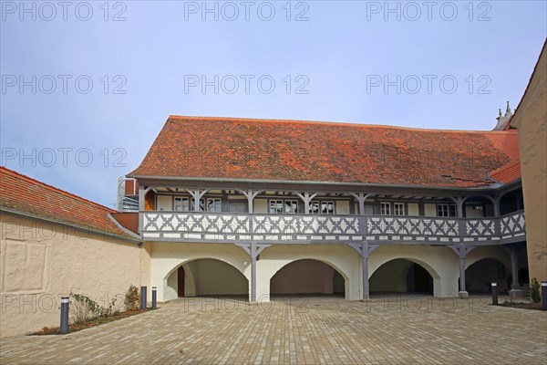 Hospital with arcade, historic half-timbered house, inner courtyard, Ochsenfurt, Lower Franconia,