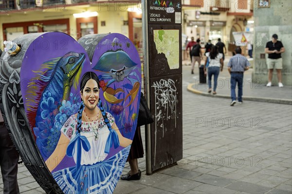 Oaxaca, Mexico, A container in the Zocalo for recycling bottles and cans, decorated and