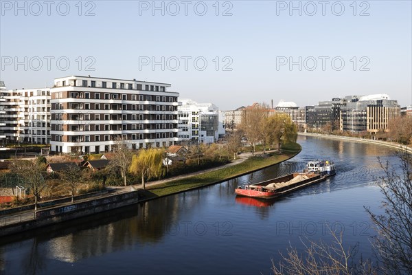 A barge loaded with sand sails on the Spree in the Charlottenburg district of Berlin, Berlin,