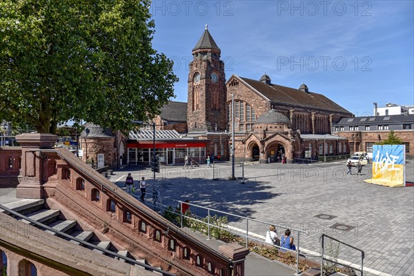 Historic Wilhelmine railway station, staircase, clock tower, reception building, neo-Romanesque and