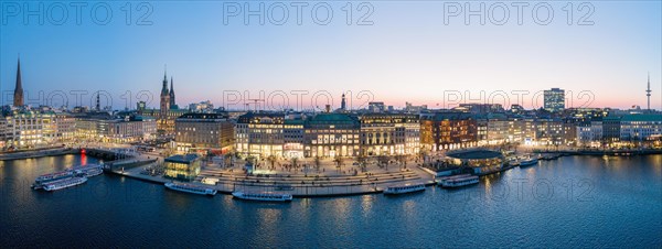 Aerial view as a panorama of the Jungfernstieg with Inner Alster Lake at blue hour, Hamburg,