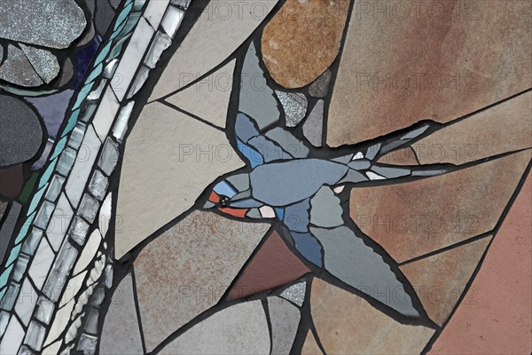 Wall mosaic with barn swallow in flight by Isidora Paz Lopez 2019, one, brown, grey, bird figure,