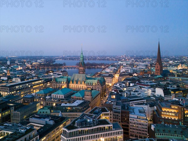 Aerial view of Hamburg City Hall with Inner Alster and Outer Alster Lake at blue hour, Hamburg,