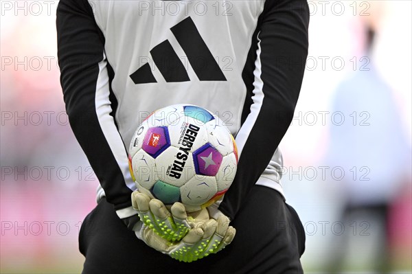 Goalkeeper coach Michael Rechner FC Bayern Munich FCB holds Adidas Derbystar match ball on his