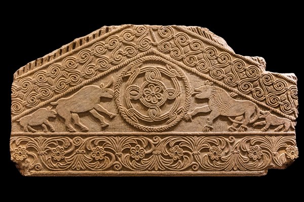 Gable of the ciborium with four animals facing a round geometric shape, Museo Cristiano with