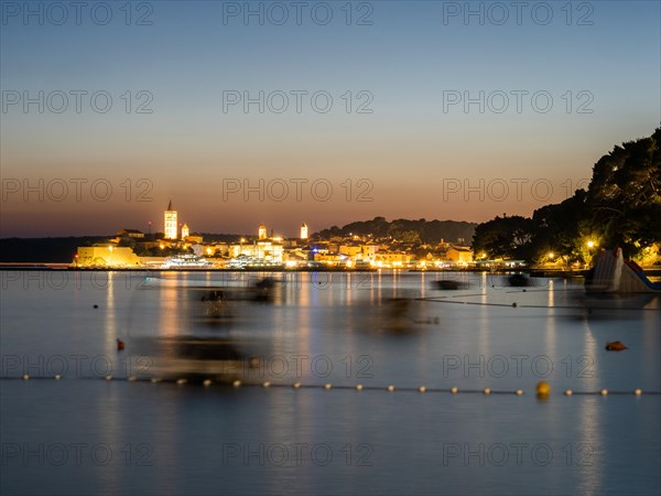 Night shot, illuminated church towers, old town centre of Rab, town of Rab, island of Rab, Kvarner