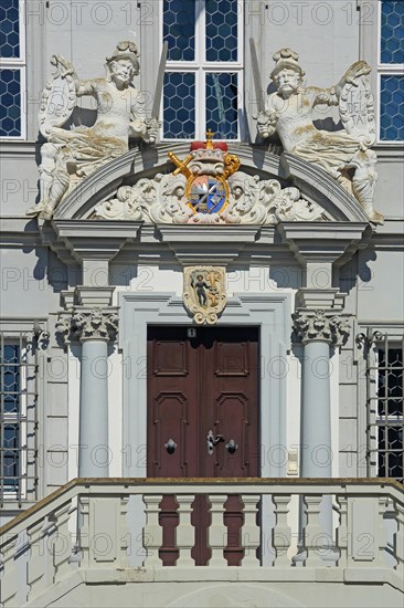 Portal with town coat of arms, figures, parapet and decorations of the baroque town hall, detail,