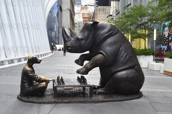 Bronze artwork for endangered animals, rhino and dog playing chess, exhibition A Wild Life for