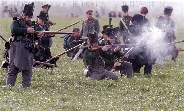 Actors in historical uniforms re-enact the battle in historical battle scenes on the 185th
