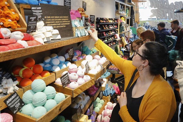 Customers in a LUSH cosmetics shop. The so-called Naked Shop offers 240 sustainable alternatives to