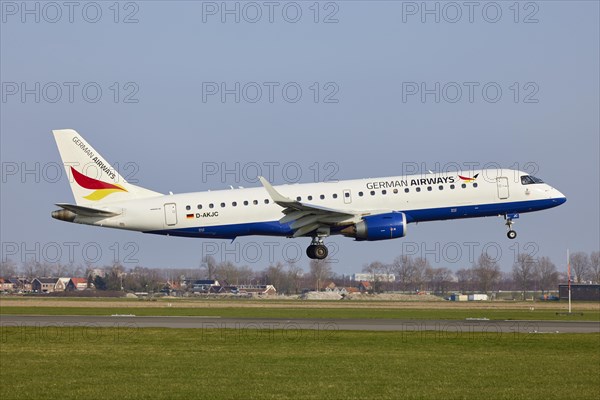 German Airways Embraer E190SR with registration D-AKJC lands on the Polderbaan, Amsterdam Schiphol
