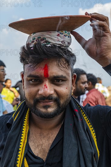 Pilgrim with burning coal, Kalika Shakti Peeth Pavagadh temple, Unesco site Champaner-Pavagadh