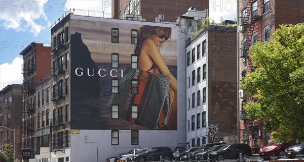 Hand-painted mural, woman with bag, advert for GUCCI, SoHo district, Manhattan, New York City, New