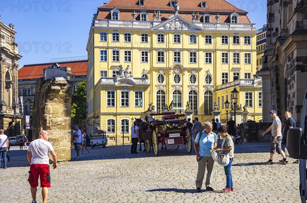 Tourist situation next to the Church of Our Lady in front of the rebuilt Coselpalais on the
