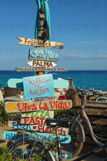 Signs in a cafe on the beach in German, Cala Rajada, Majorca, Majorca, Balearic Islands, Spain,