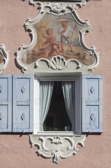 Window in a historic house with Lueftlmalerei in Ludwigstrasse, Partenkirchen district,