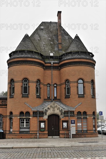 Davidwache police station, Reeperbahn, St. Pauli, A historic brick building with a pointed roof and