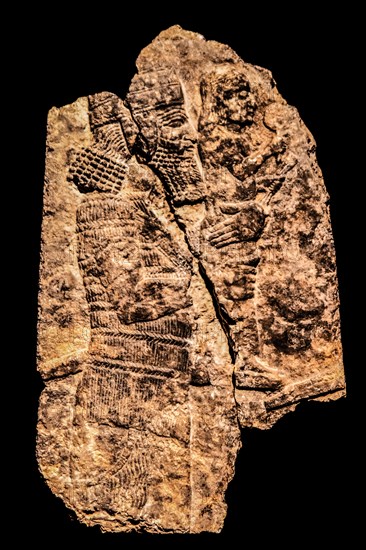 Assyrian soldier removing a statue of a god from a temple in an enemy city, Ninieveh, South-West
