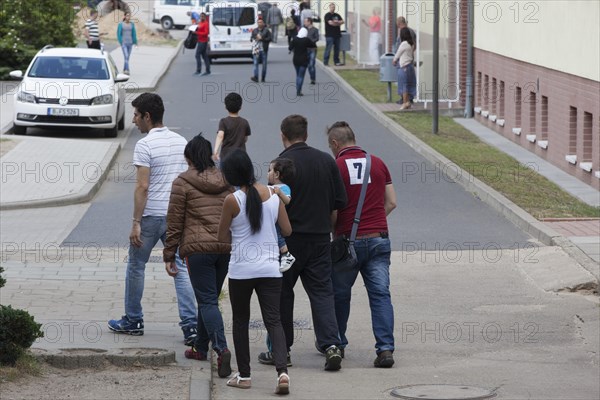 Refugees at the central contact point for asylum seekers in the state of Brandenburg in