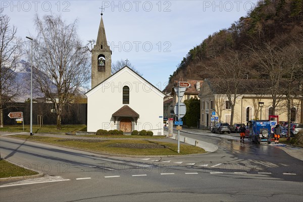 Bell tower with church Clocher de la chapelle St. Michel in Martigny, district of Martigny, canton