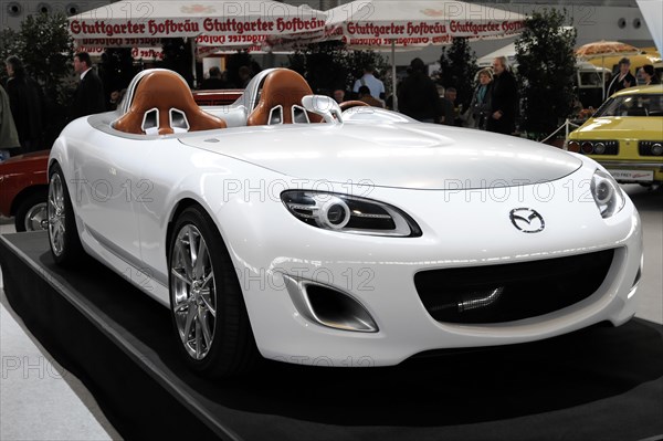 RETRO CLASSICS 2010, Stuttgart Messe, A white Mazda convertible sports car model presented at a