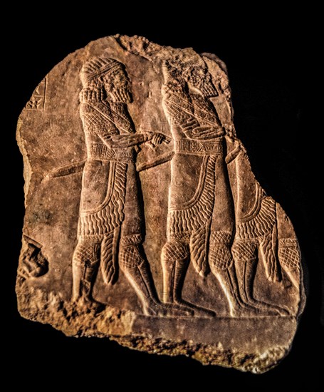 The army, a powerful tool for building the Assyrian empire, three officers of the royal guard on