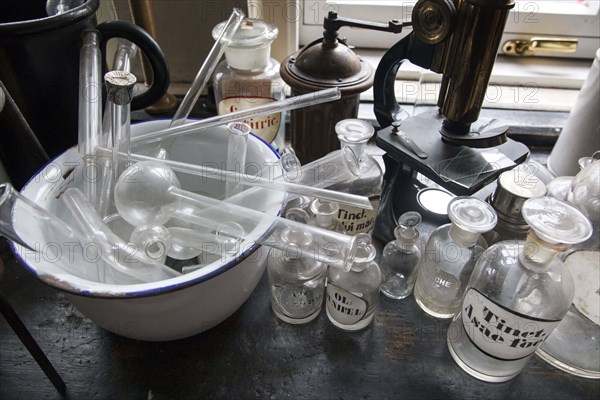 Glass jars for the production of medicines stand in the former laboratory in the historic Berg