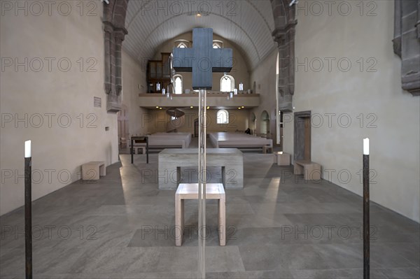 4 candles and a glass cross at the former altar site, St Clare's Church, Koenigstrasse 66,