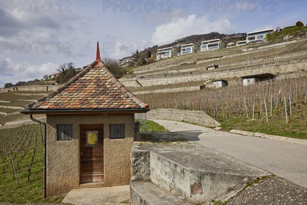 Historic small house with a square floor plan and red roof in the UNESCO World Heritage Site of the