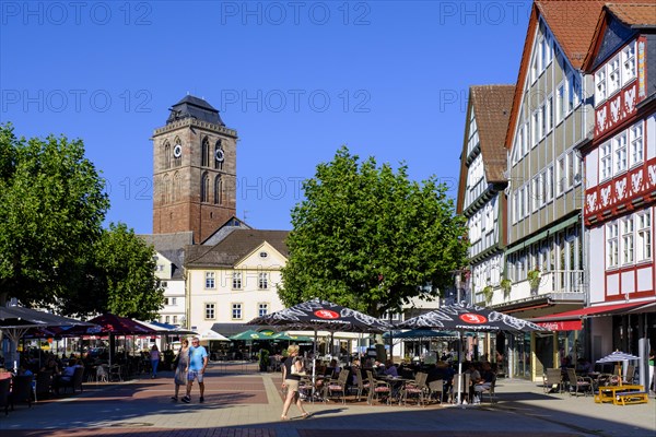 Pedestrian zone with restaurant and street cafe, Linggplatz, bell tower of the Gothic town church,
