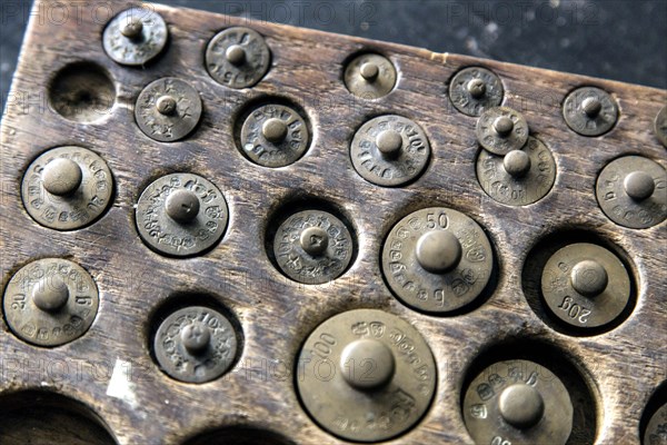 Weights for a pharmacist's precision balance in the historic Berg Pharmacy in Clausthal-Zellerfeld.