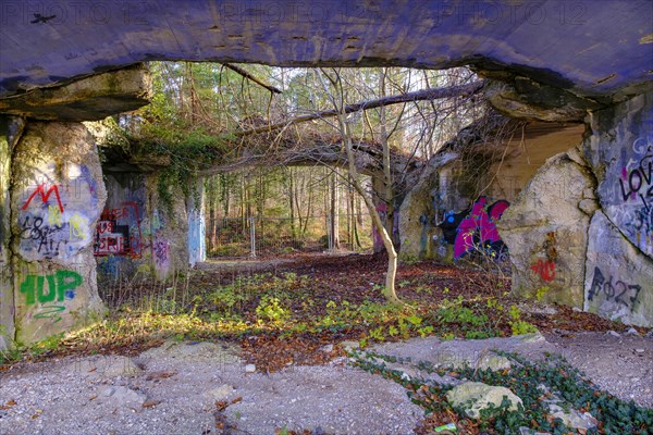 Colourfully painted ruins of a production bunker of the former explosives factory from the Third